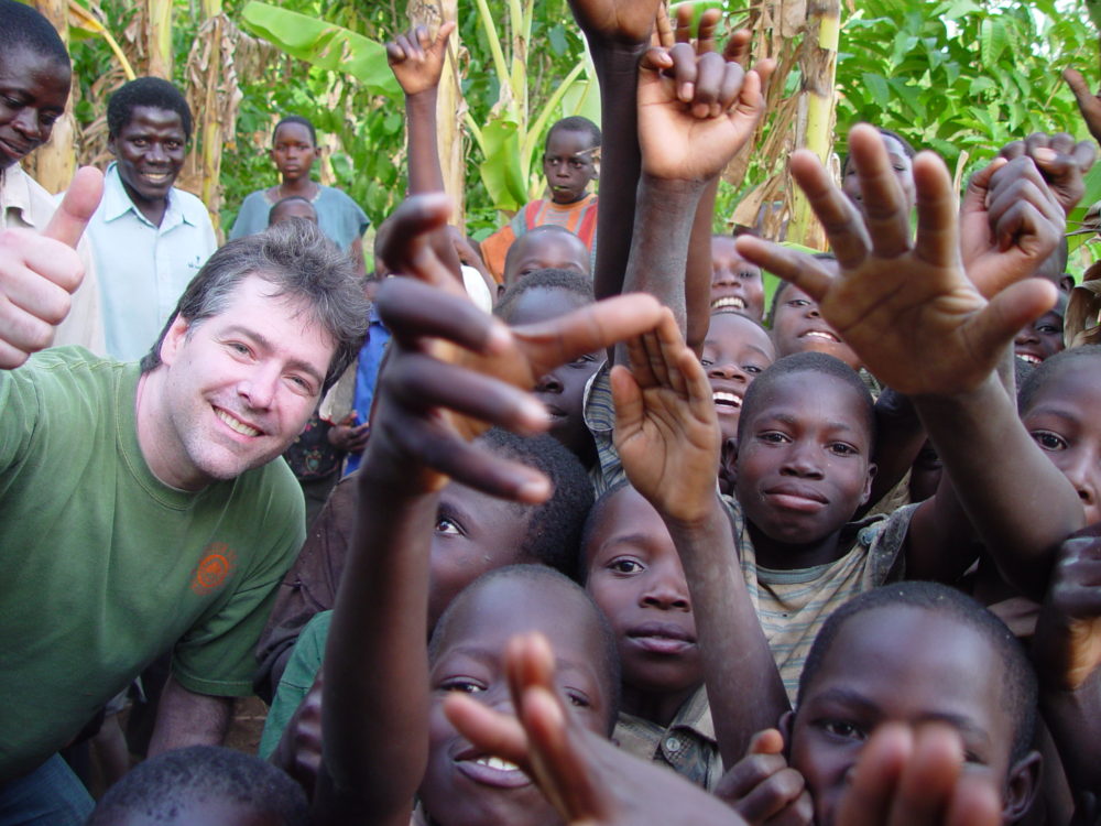 Béla with kids in Uganda