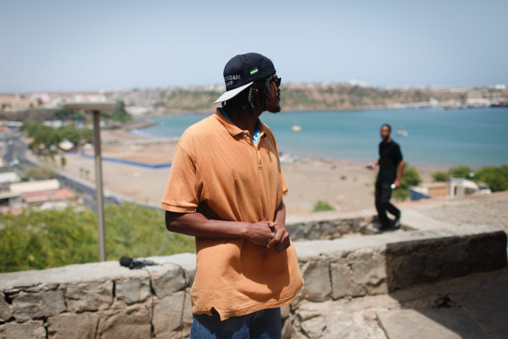 Manolo looks at downtown Praia from the neighborhood Achada Santo Antonio, where he has his studio.