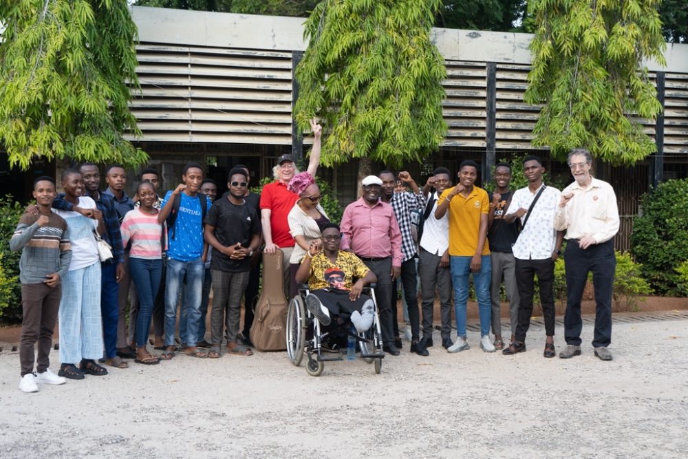 Sean, Banning and John Kitime with U of Dar students and professors