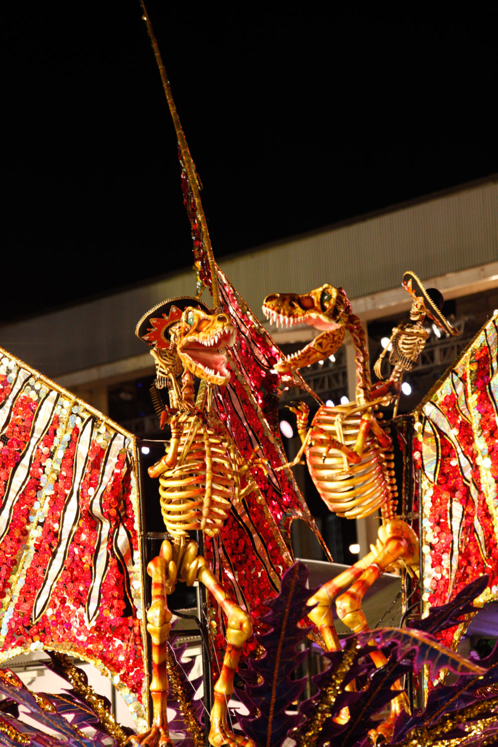 Skeletal "Dos Banditos," riding dinosaur skeletons