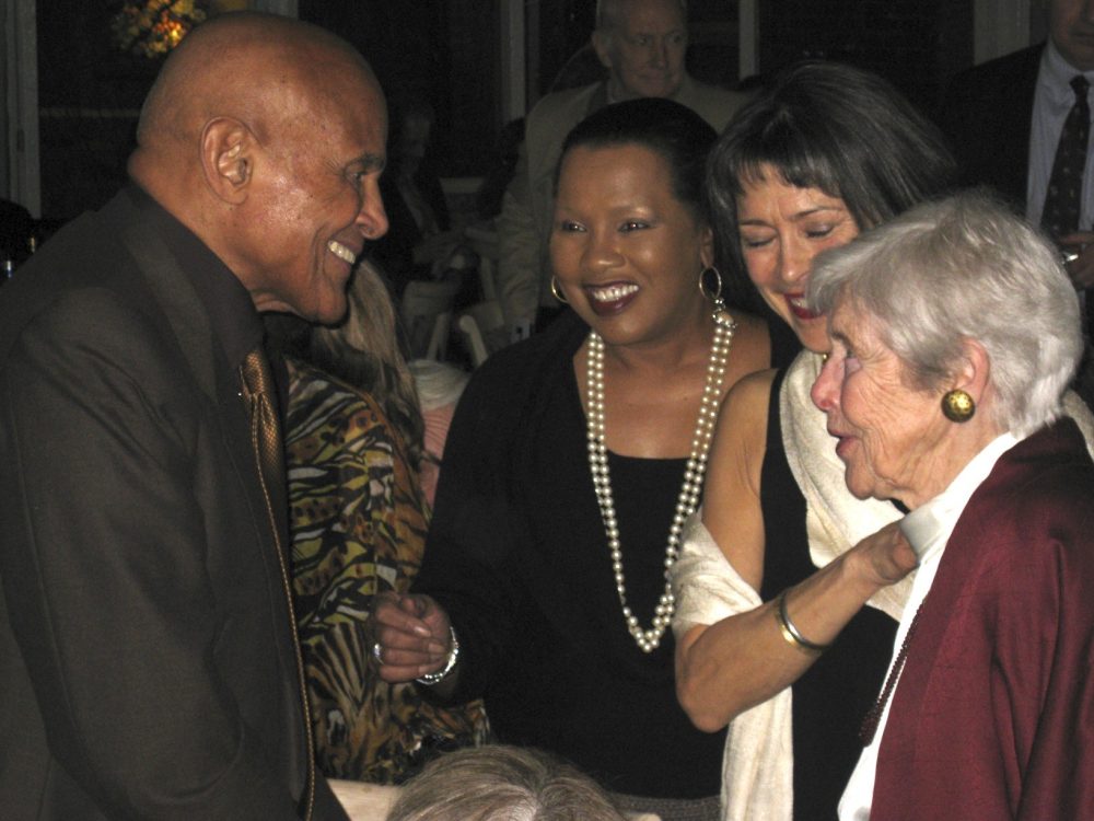 Harry greets Sean Barlow's mother Doris and sister Ellen at Afropop 20th anniversary gala in 2008