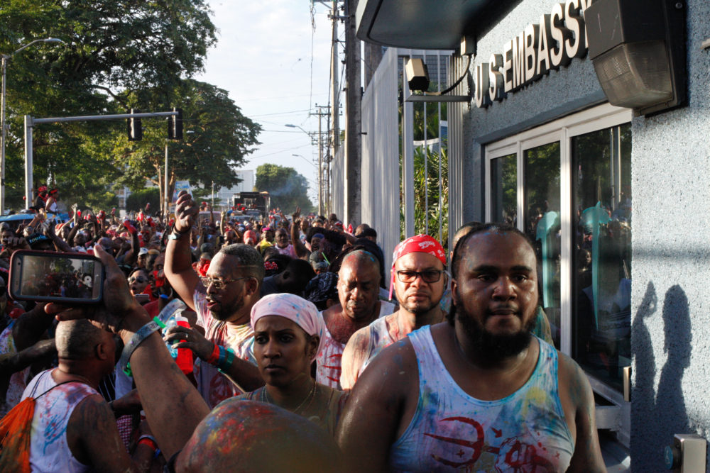 J'Ouvert passes the U.S. Embassy in Port of Spain