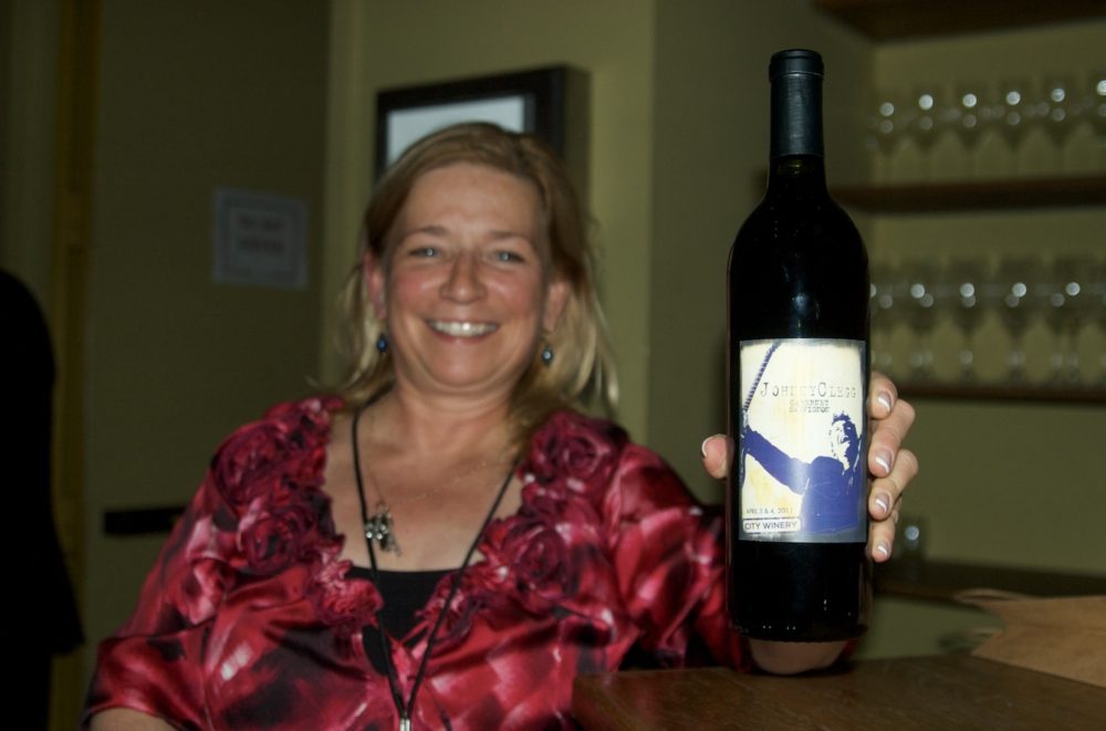 Johnny's U.S. agent Anne Marie Martins with Johnny Clegg-label wine!