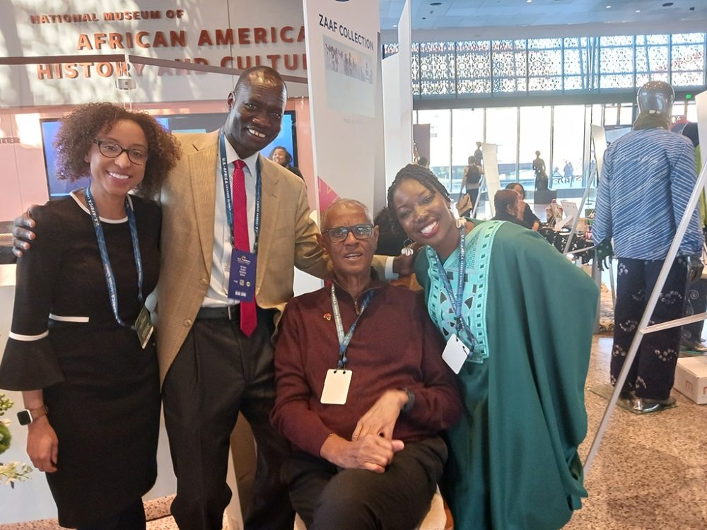 Melvin Foote, founder and President of Constituency for Africa (seated)