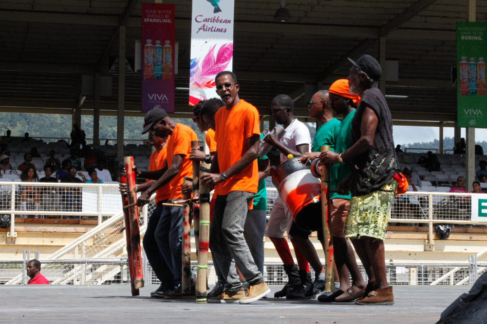 Not mas, but tradition. A tamboo bamboo band, playing complex rhythms with bamboo sticks