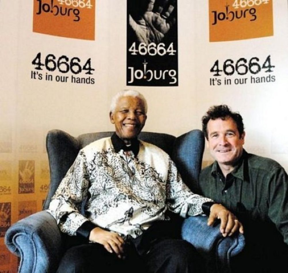 Nelson Mandela and Johnny Clegg. 46664 signifies Mandela's Robben Island prisoner ID number.
