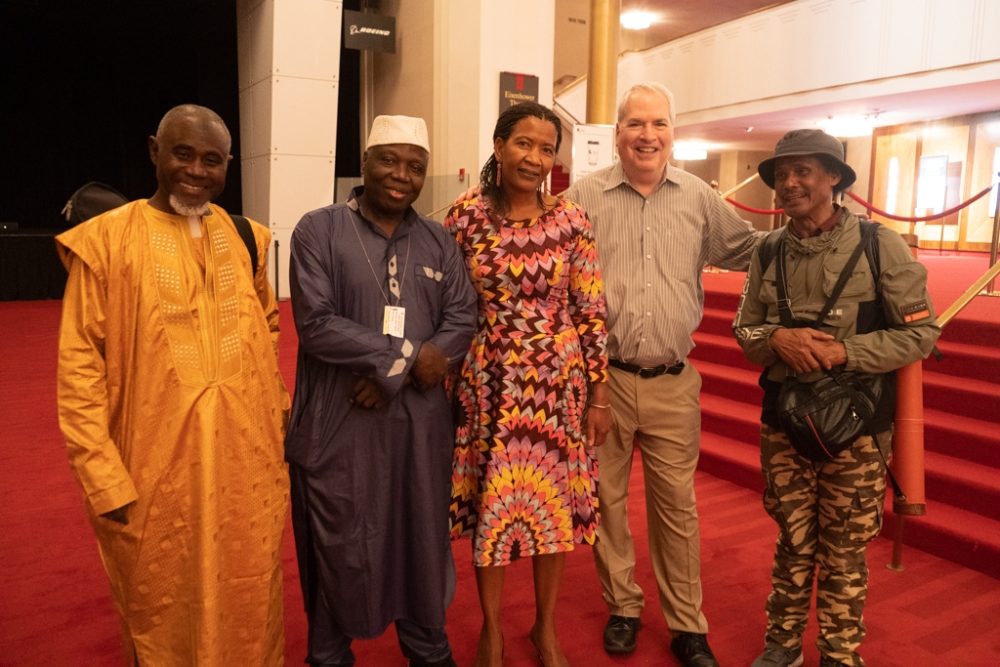 Afropop Board Chairman David Greeley (Second from right), his wife Sali and members of the Niger River Ensemble