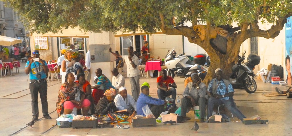 Guinean women selling kola nuts on the side of one of Lisbon’s major squares. Once you start looking, the influence of African culture is everywhere in the city.