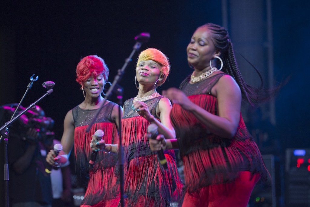 Bella Mondo's frontline of three dynamis singers, backed by six female musicians all from Cote d'Ivoire performing at a special International Women's day show at the Palais de la Culture Abidjan. photo William Farrington