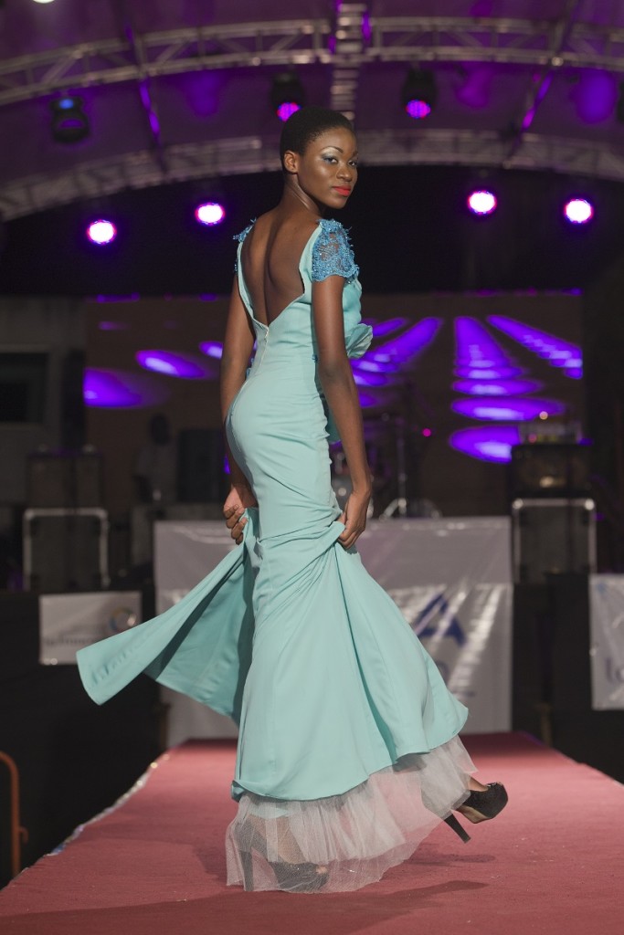 A nightly runway displayed the work of dozens of African fashion houses including this dress designed by emerging Ivorian Franck Gnamien who though still in his mid twenties is getting accolades for his 'G Christ' label. photo William Farrington