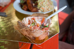 Conch salad in a coconut shell, at the “Fish Fry” waterside restaurant row, Nassau. 